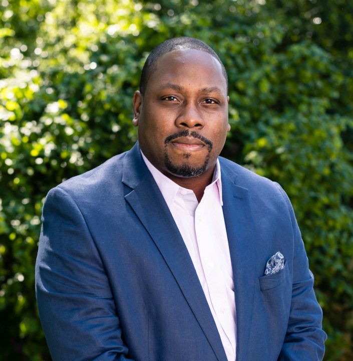 Jon Gosier in a blue blazer at his Atlanta home