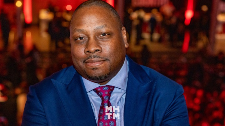 Jon Gosier at an entertainment industry event in a blue suit