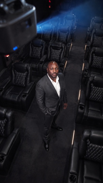 Overhead portrait of Jon Gosier in a screening room