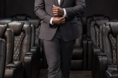Jon Gosier walking through a private screening room