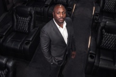 Overhead portrait of Jon Gosier in a screening room